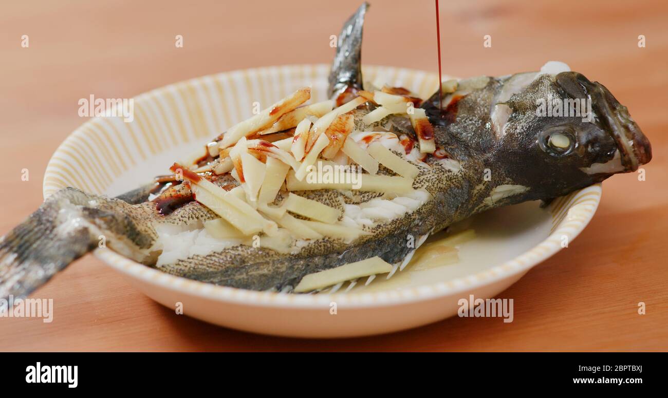 Chinese style steamed fish Stock Photo - Alamy