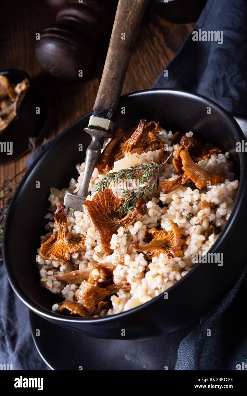 Kaszotto- polish risotto from barley groats with mushrooms Stock Photo ...