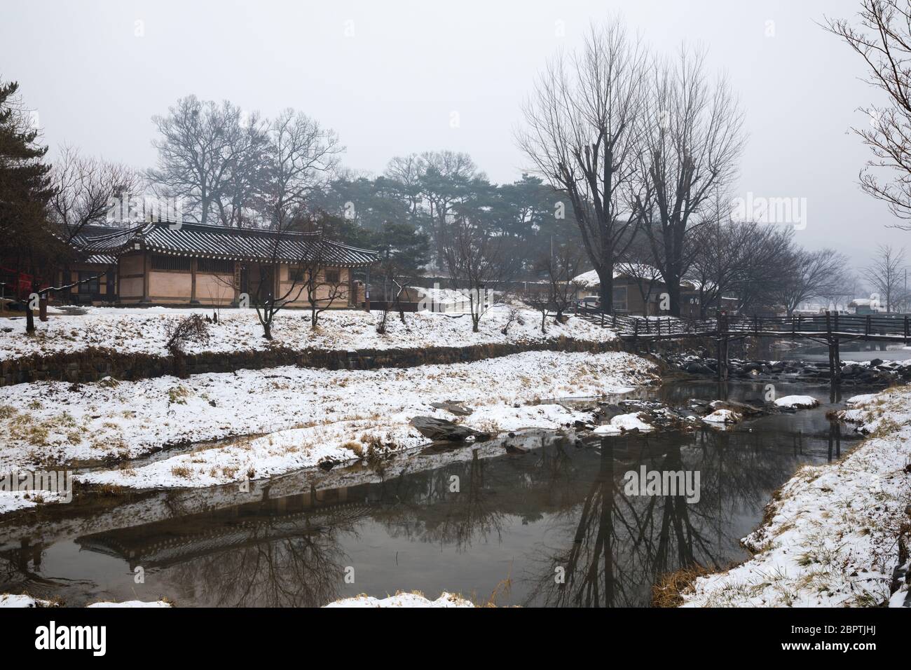 Winter in Korea, snowy traditional village landscape. Oeam Folk Village
