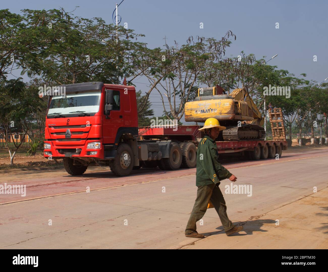 Chinese trucks delivering goods in the Golden Triangle Special Economic Zone In Laos Stock Photo
