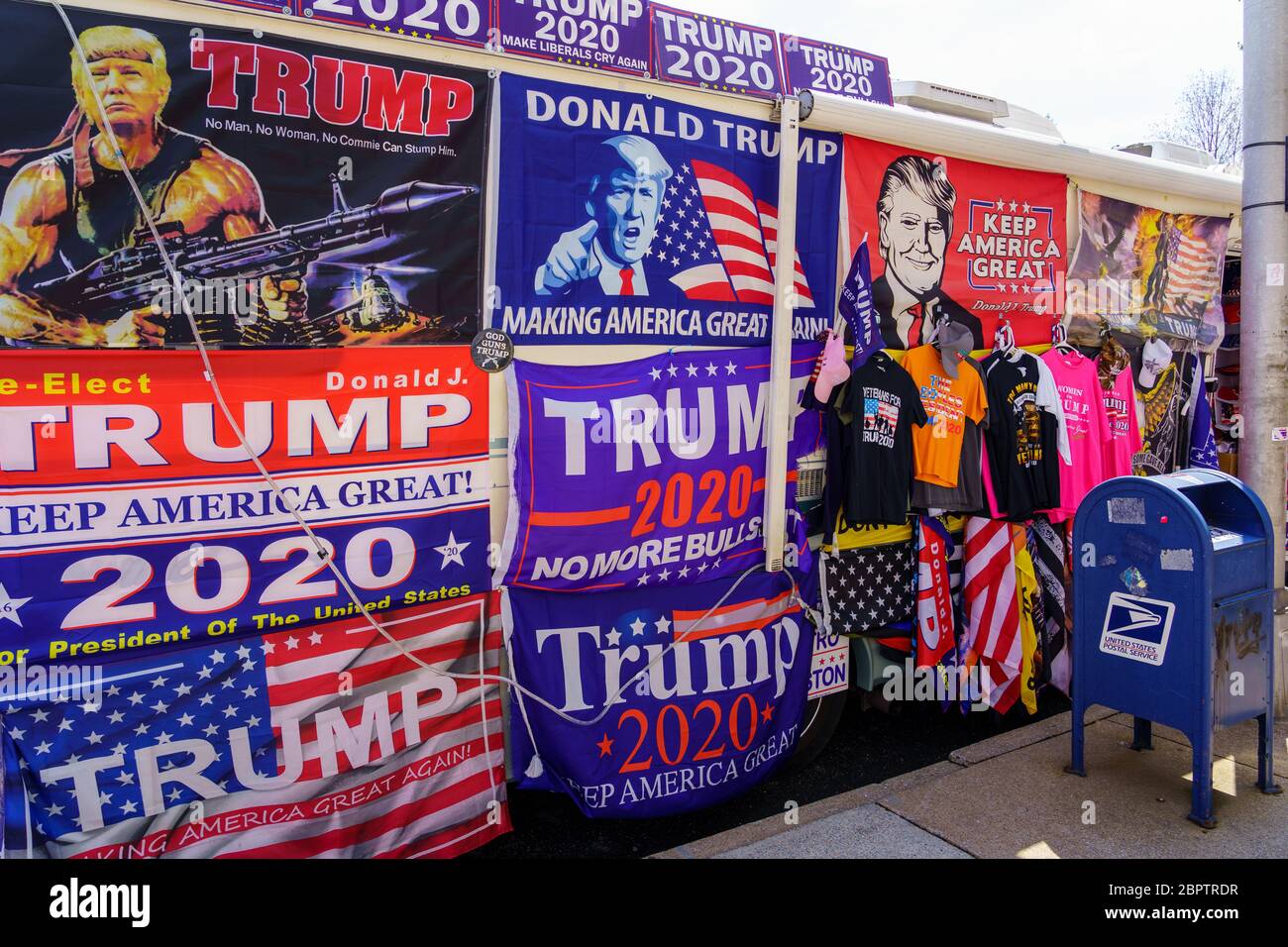 Harrisburg, PA / USA - May 15, 2020: A large RV parked along a street at the capitol building displays Trump 2020 campaign signs. Stock Photo