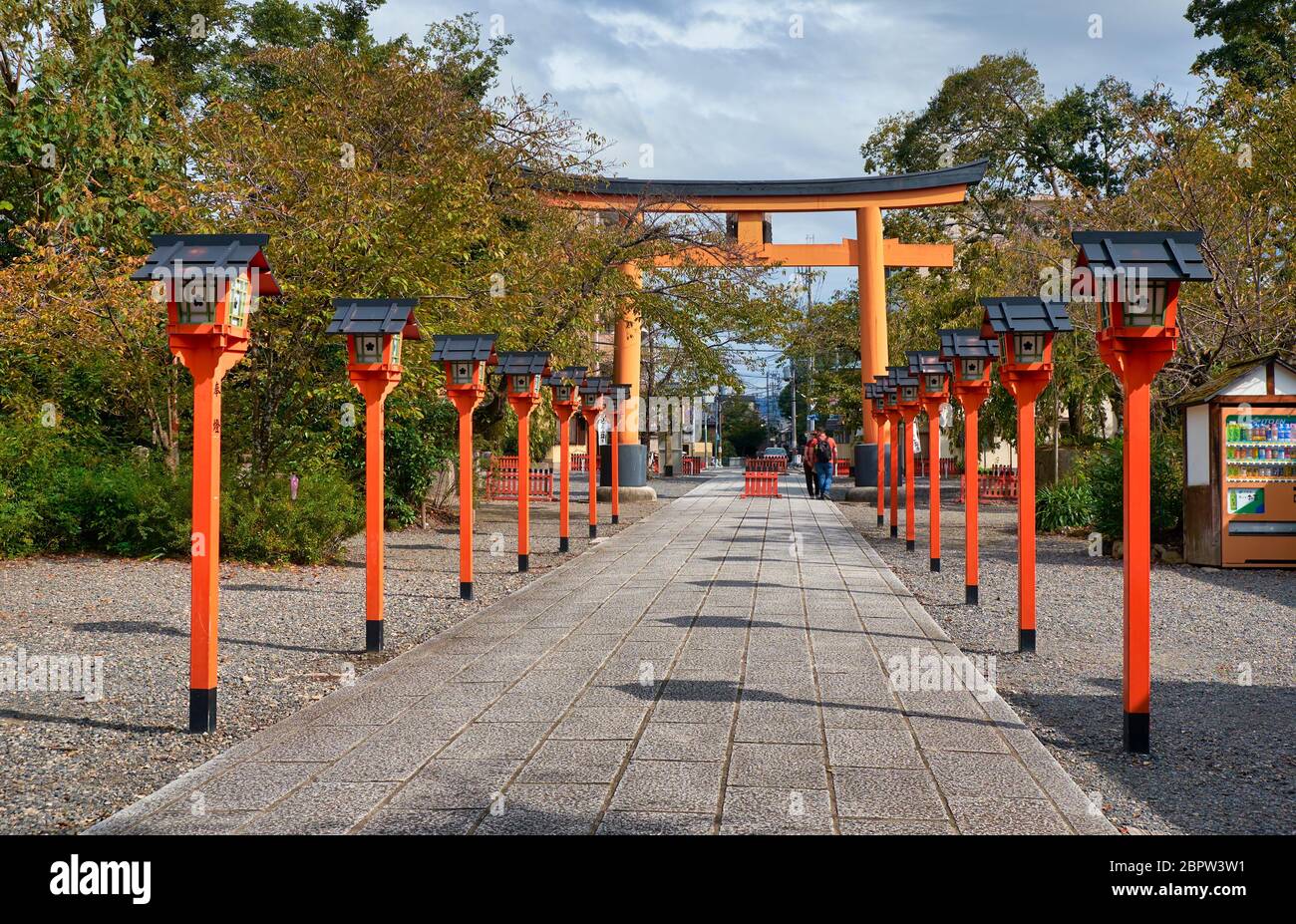 KYOTO, JAPAN - OCTOBER 17, 2019: The front way (sando) to the Hirano Shrine decorated along its course with the red lanterns.  Kyoto. Japan Stock Photo