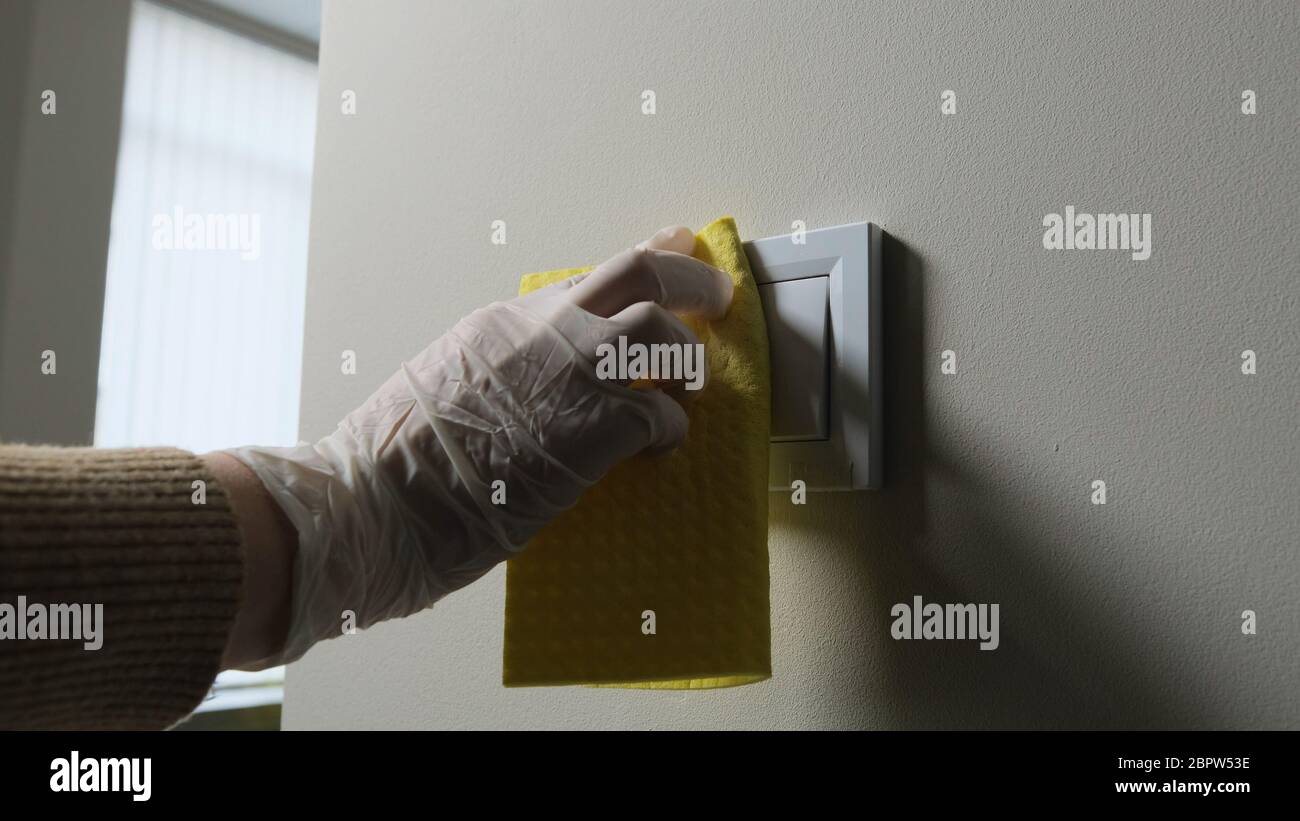 People cleaning and disinfecting domestic surfaces to kill virus and germs. Housewife job and