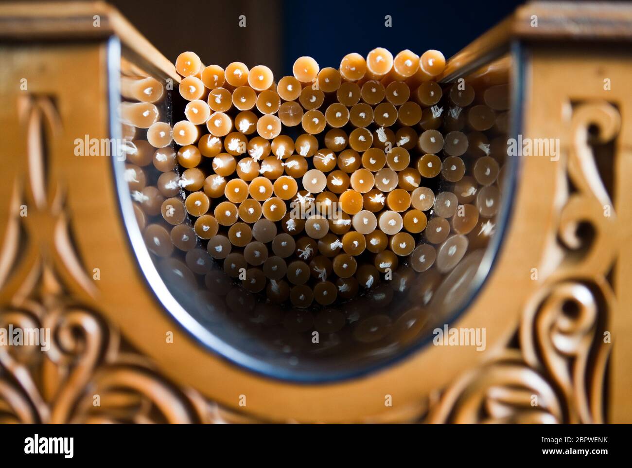 Candles at the entrance to a Greek Orthodox church Stock Photo