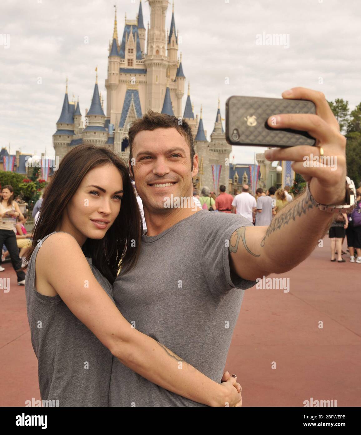 (Nov. 26, 2010): Actor Brian Austin Green (right) and his wife, actress/model Megan Fox (left), take a souvenir photo Nov. 26, 2010 in the Magic Kingdom in Lake Buena Vista, Fla. Green ('Beverly Hills, 90210', 'Desperate Housewives') and Fox ('Transformers,' 'Transformers: Revenge of the Fallen') were married in June 2010 in Hawaii. People: Megan Fox Brian Austin Green Credit: Storms Media Group/Alamy Live News Stock Photo
