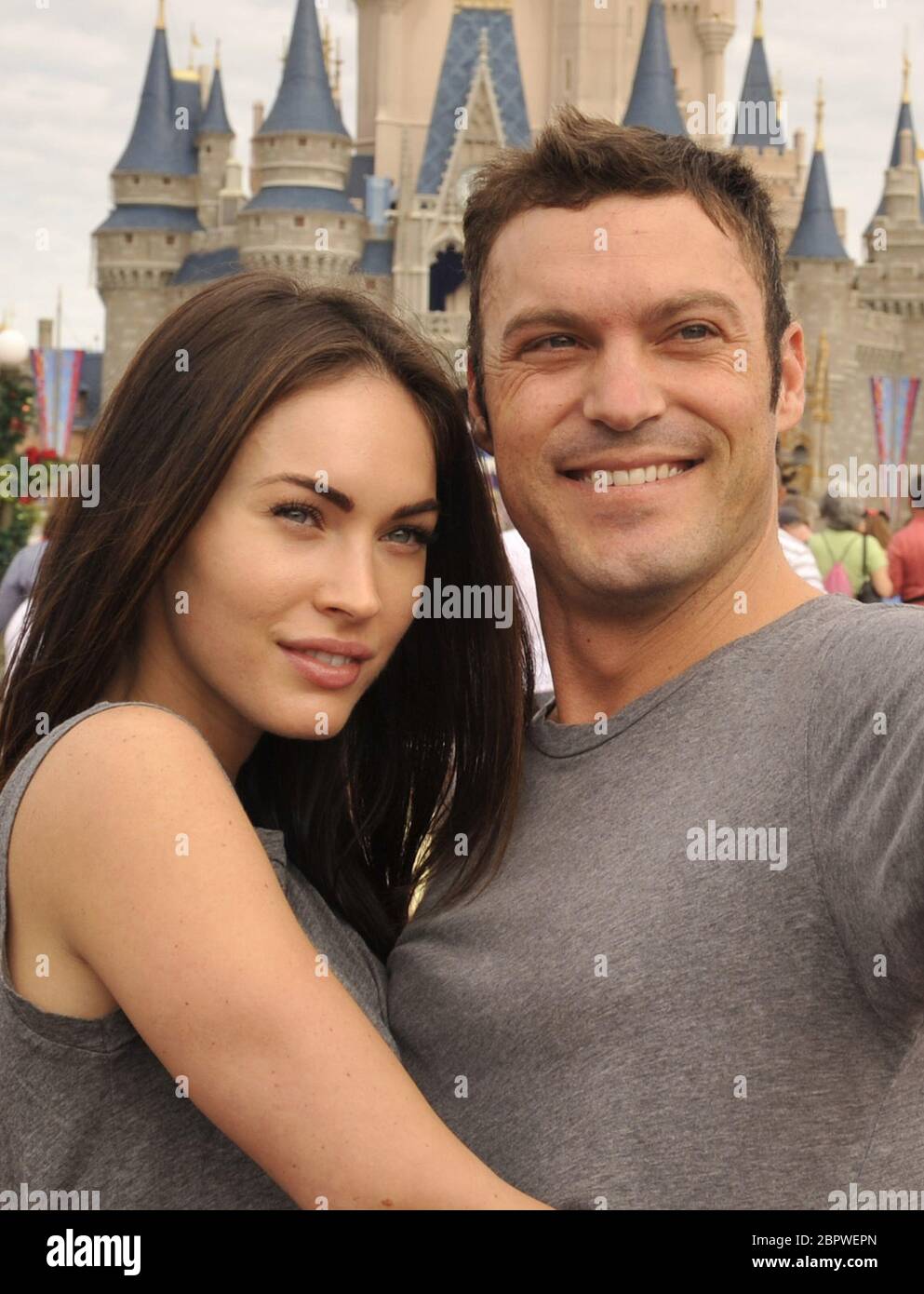 (Nov. 26, 2010): Actor Brian Austin Green (right) and his wife, actress/model Megan Fox (left), take a souvenir photo Nov. 26, 2010 in the Magic Kingdom in Lake Buena Vista, Fla. Green ('Beverly Hills, 90210', 'Desperate Housewives') and Fox ('Transformers,' 'Transformers: Revenge of the Fallen') were married in June 2010 in Hawaii. People: Megan Fox Brian Austin Green Credit: Storms Media Group/Alamy Live News Stock Photo
