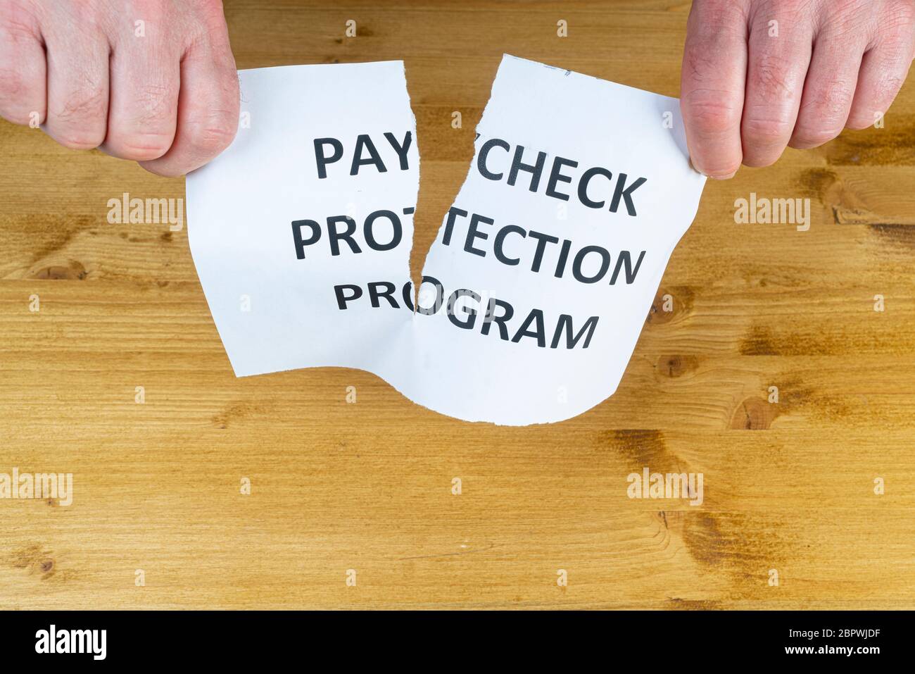 a man gives up on the  paycheck protection program Stock Photo