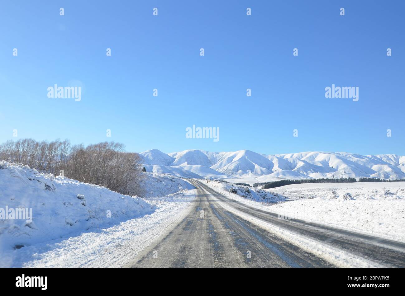 The winter snowy road from Lake Tekapo to Christchurch. The journey pass through several towns