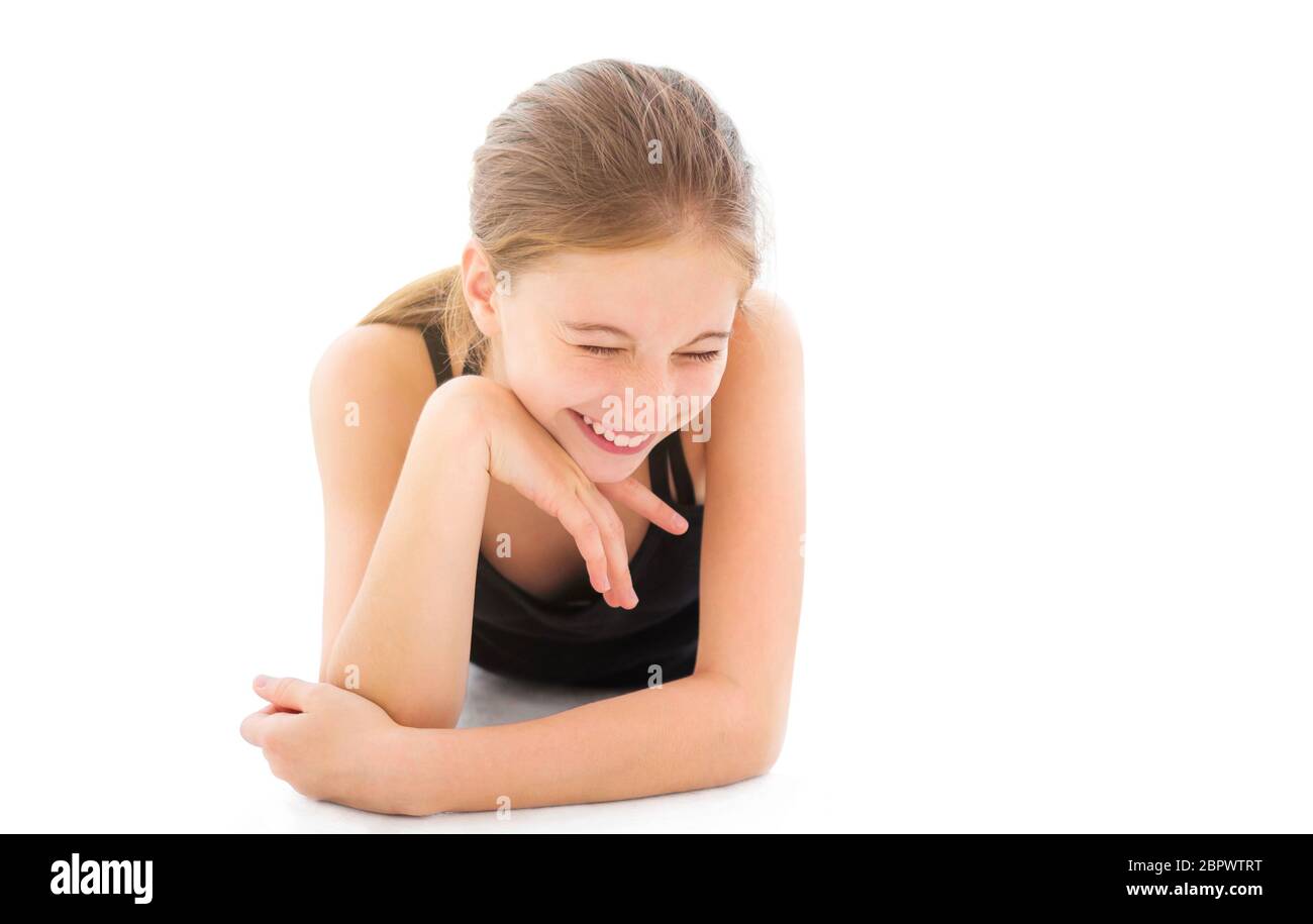 Cute teenager girl lying on a floor Stock Photo - Alamy