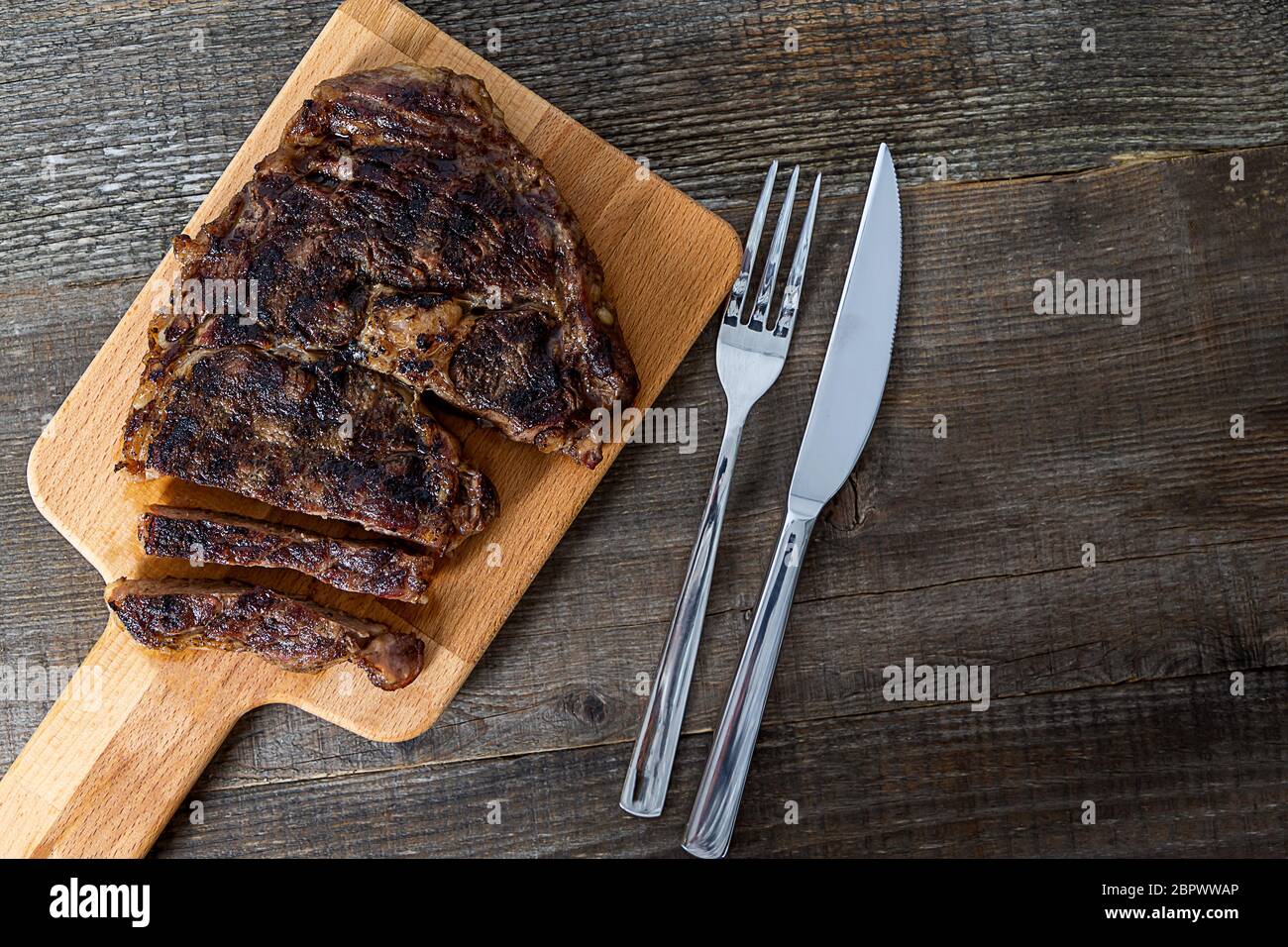 Grilled black angus rib eye steak Stock Photo