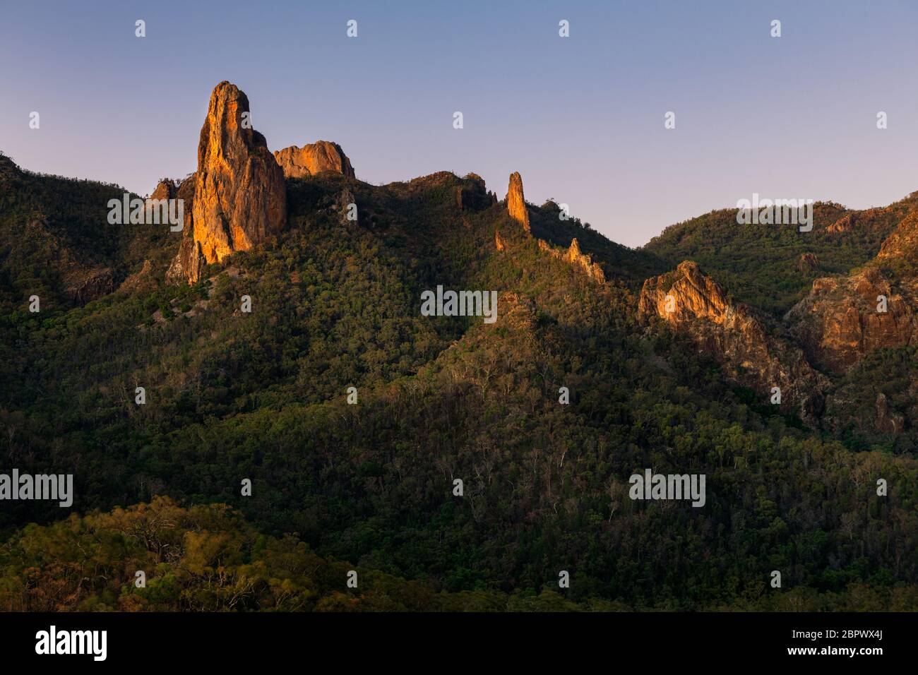 Glowing mountains at dawn in Warrumbungle National Park. Stock Photo