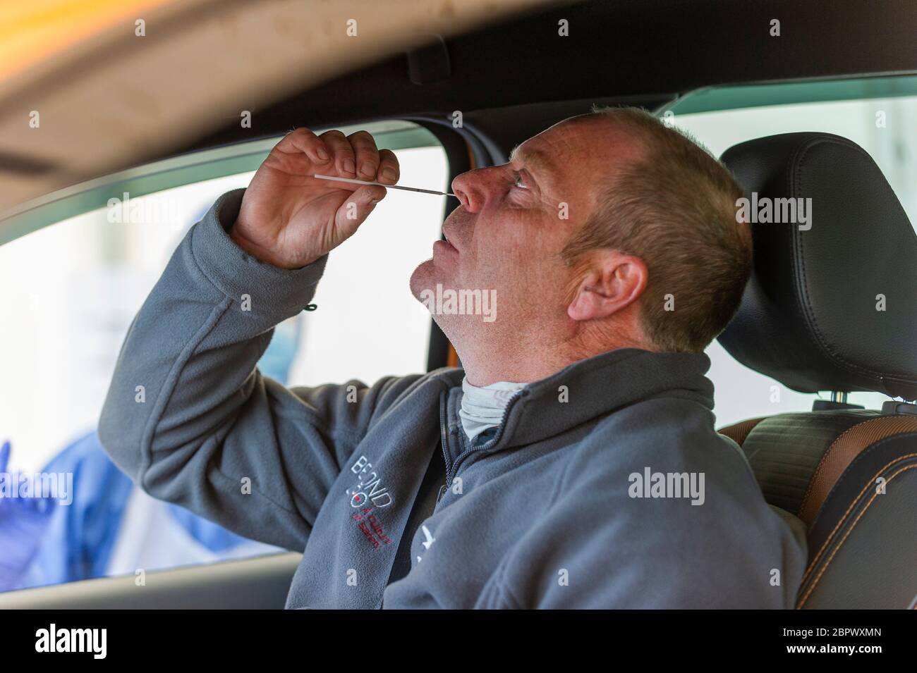 UK Coronavirus. Norwich, Norfolk, UK, 20th May 2020 Coronavirus testing station in Norwich where swab test are conducted inside cars, people swabbing themselves under instruction of the medical staff on site.  Credit Jason Bye/Alamy Live News Stock Photo