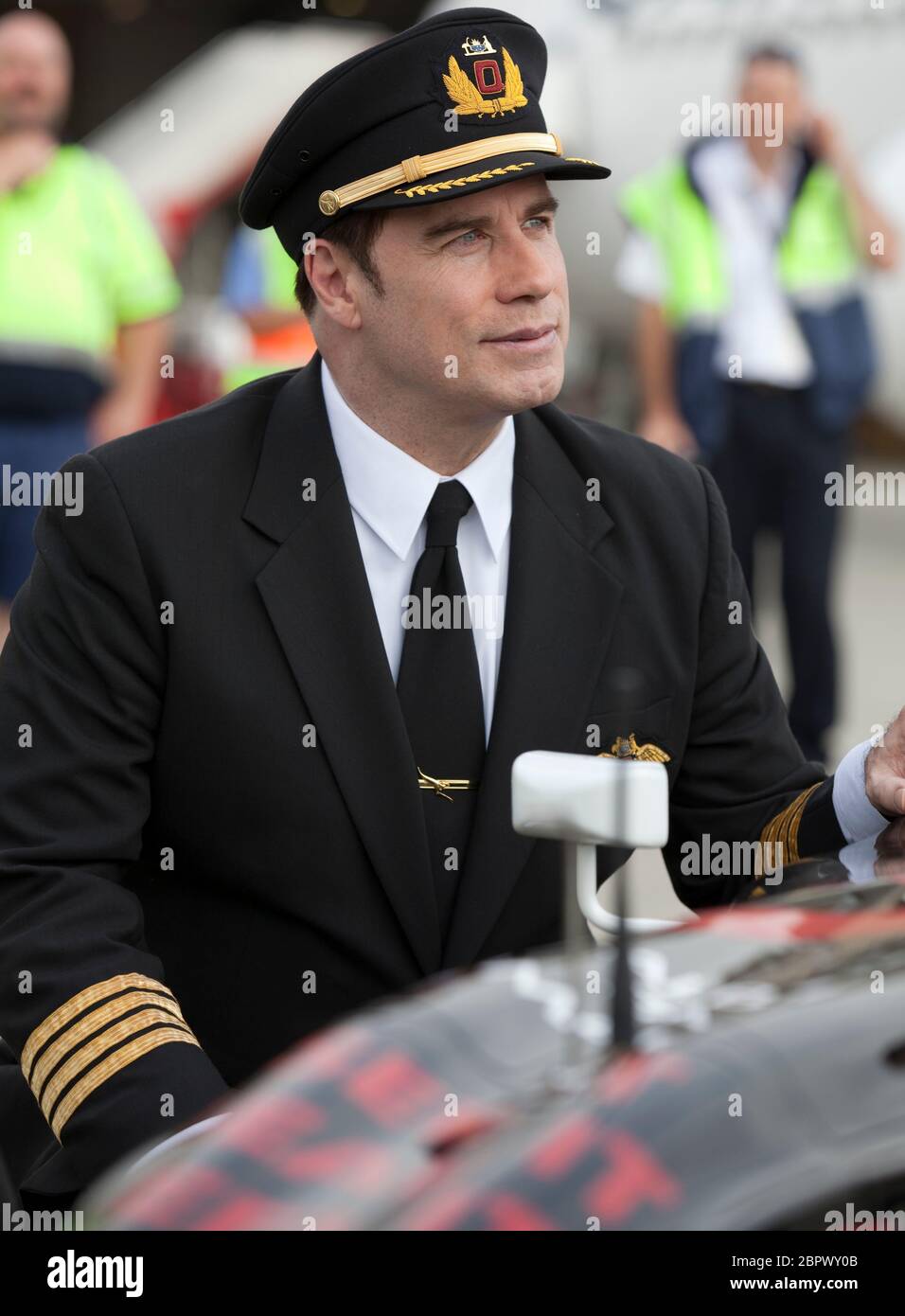 John Travolta wearing Qantas pilot's uniform, Melbourne airport, 2010. Stock Photo