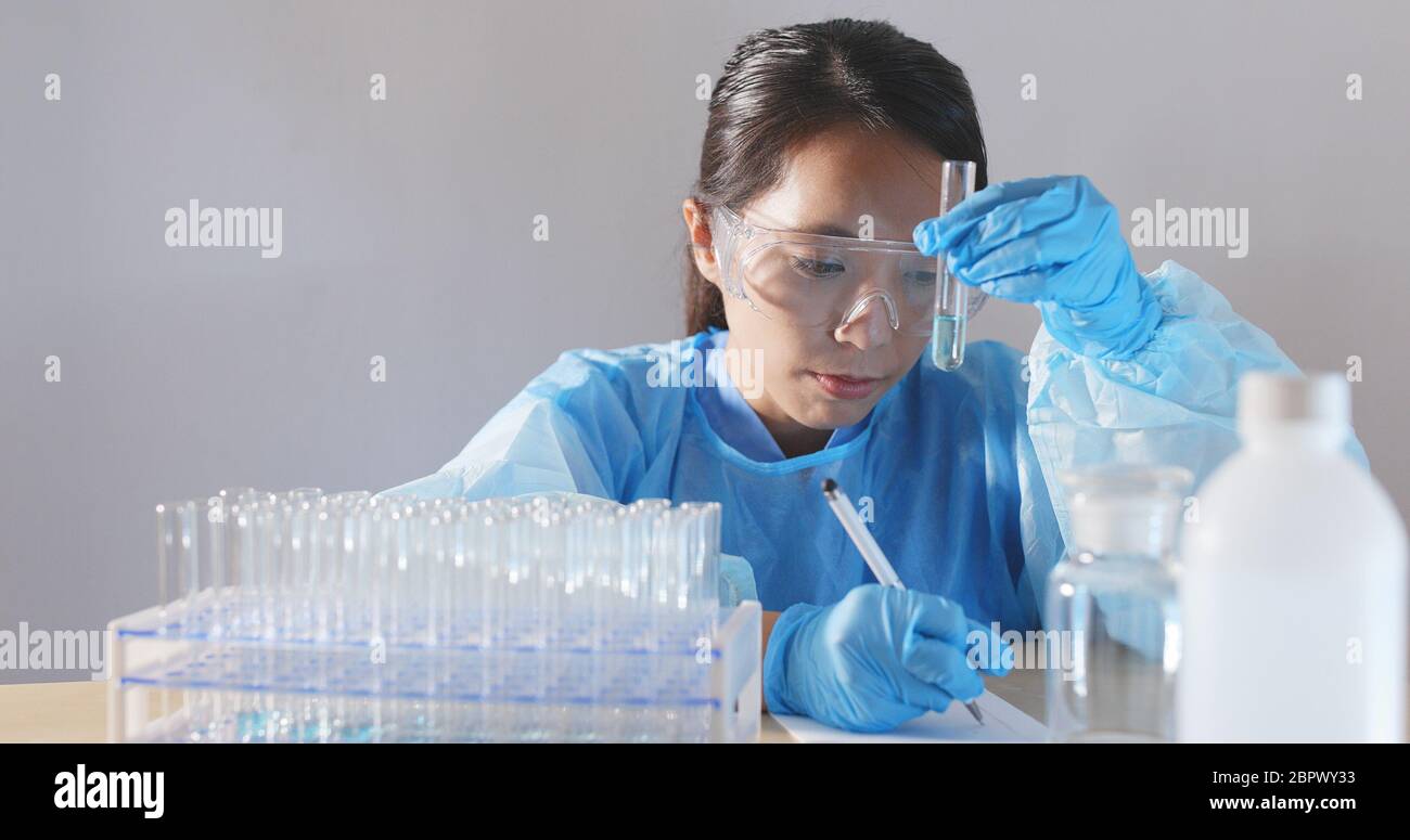 Adult women doing science experiment hi-res stock photography and ...
