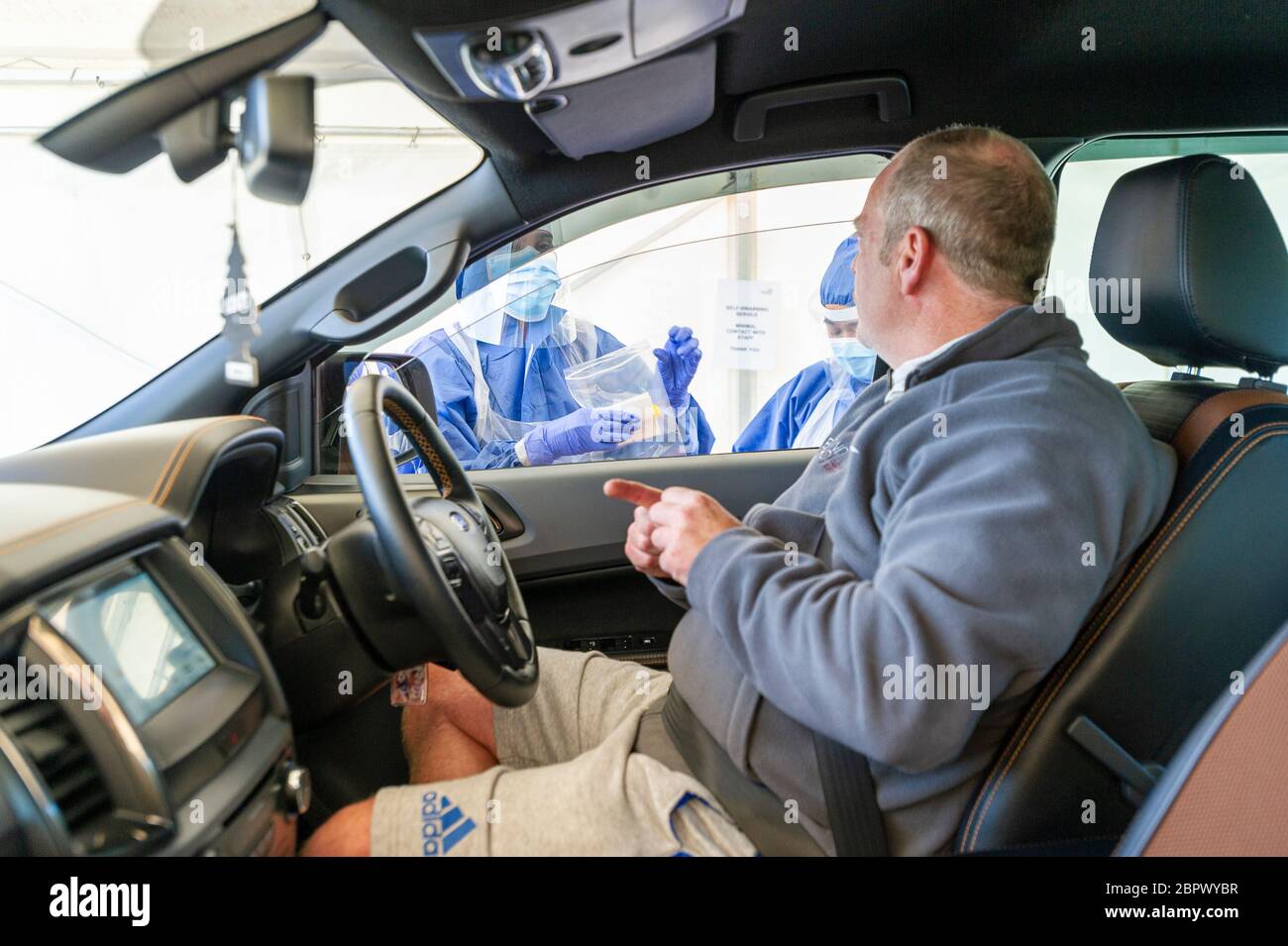 UK Coronavirus. Norwich, Norfolk, UK, 20th May 2020 Coronavirus testing station in Norwich where swab test are conducted inside cars, people swabbing themselves under instruction of the medical staff on site.  Credit Jason Bye/Alamy Live News Stock Photo