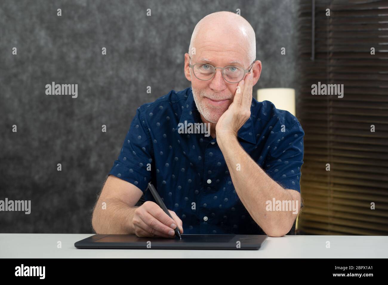 a senior designer using graphic tablet at office Stock Photo
