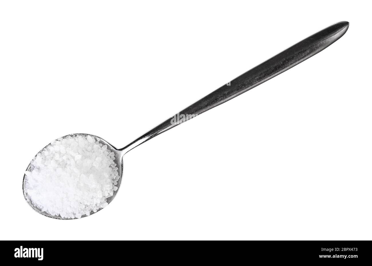 top view of tablespoon with coarse grained Sea Salt isolated on white