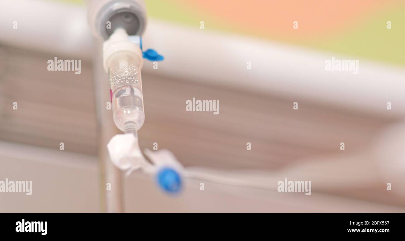 Infusion pump or Saline solution intravenous drip for patient Stock
