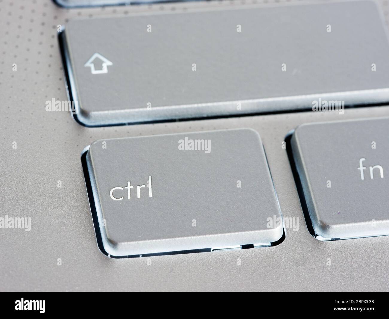 Ctrl Control key on silver laptop keyboard. Close up Stock Photo Alamy