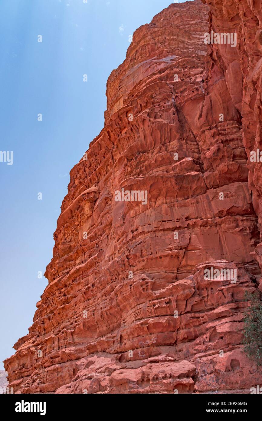 Eroded Red Cliffs in the Desert in Wadi Rum in Jordan Stock Photo