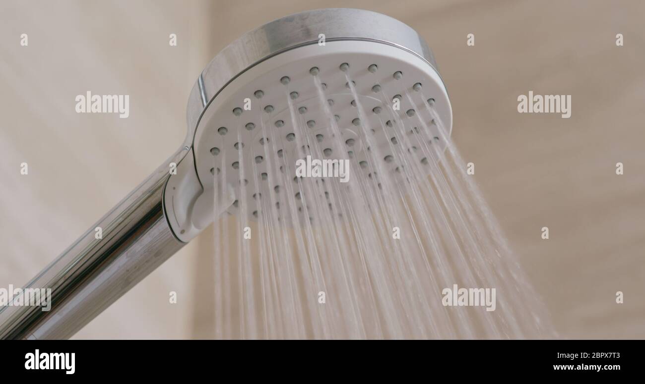 Turning on the shower Stock Photo Alamy