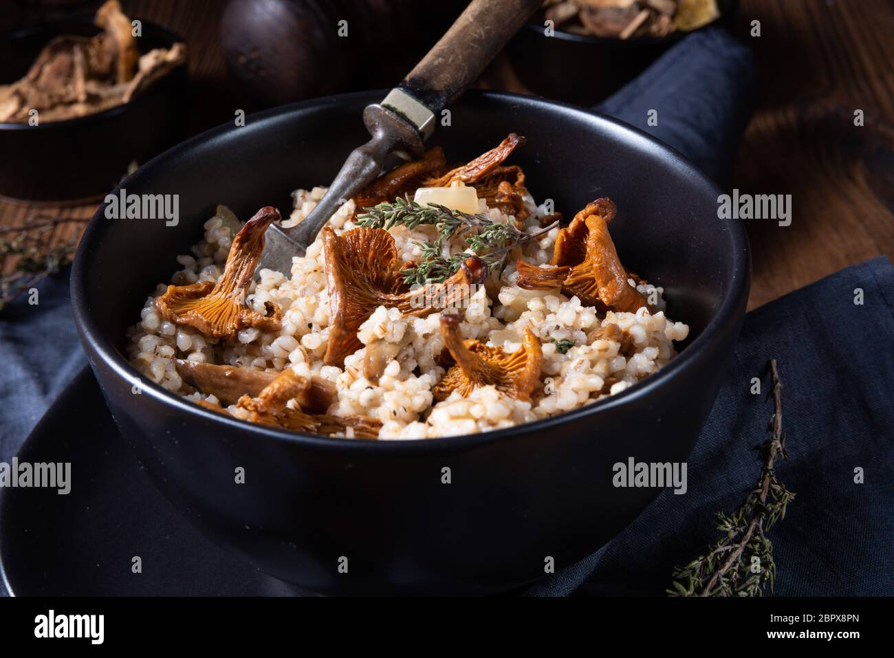 Kaszotto- polish risotto from barley groats with mushrooms Stock Photo ...