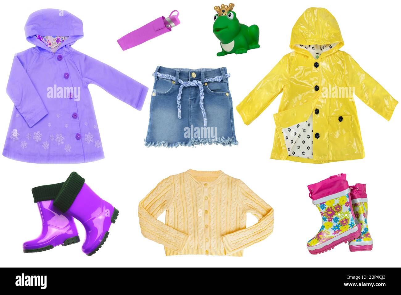 Collage set of little girl clothes isolated on a white background. The collection of  rain jackets, sweater, a jeans skirt, rubber boots and other equ Stock Photo