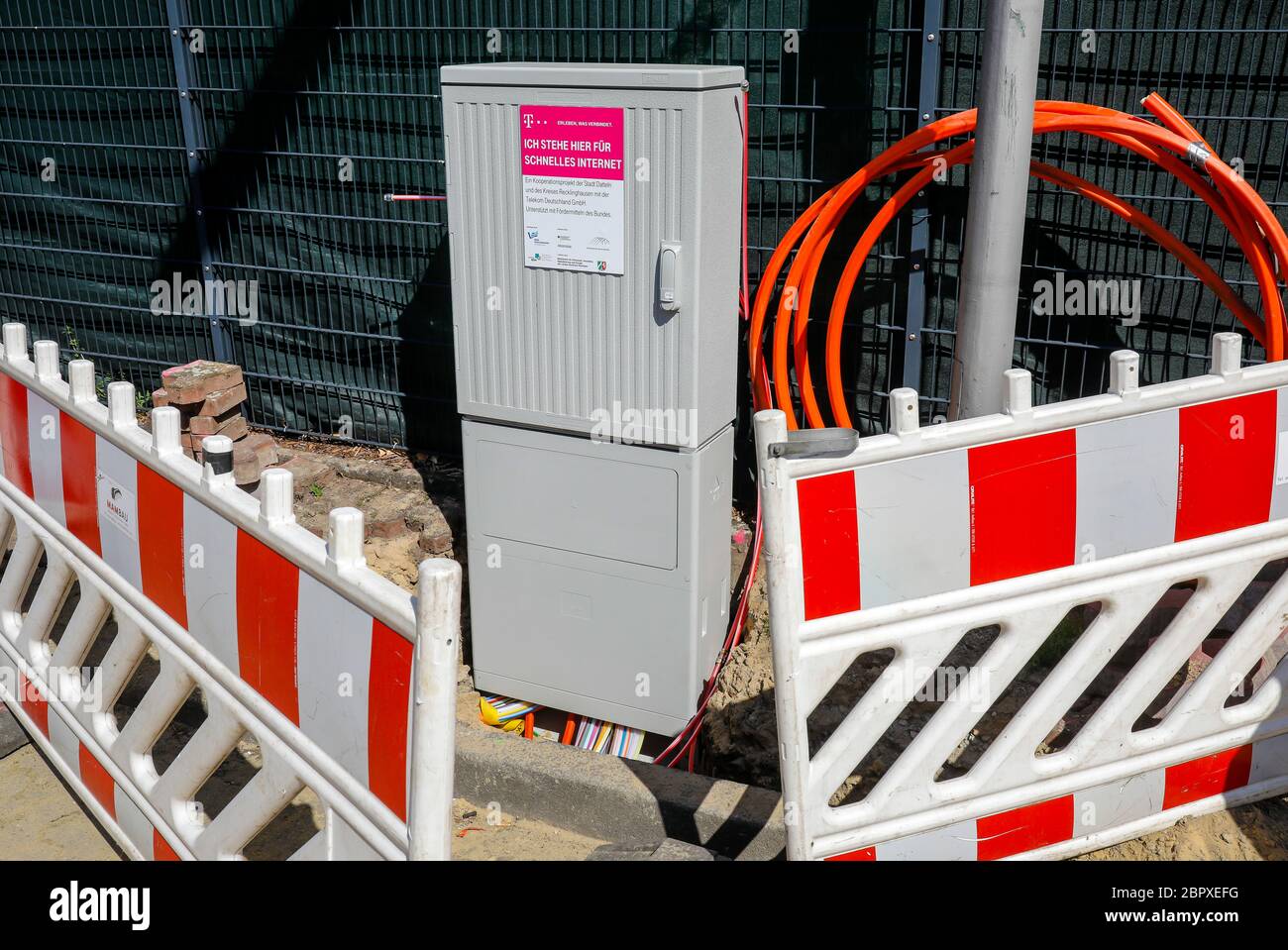Datteln, Ruhrgebiet, Nordrhein-Westfalen, Germany - Telekom distribution box for fast internet, construction site DSL cable connection for households. Stock Photo