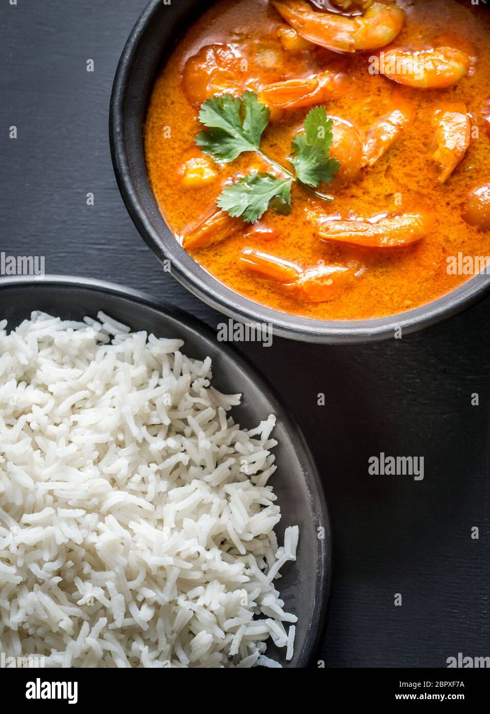 Bowl of thai yellow curry with seafood Stock Photo