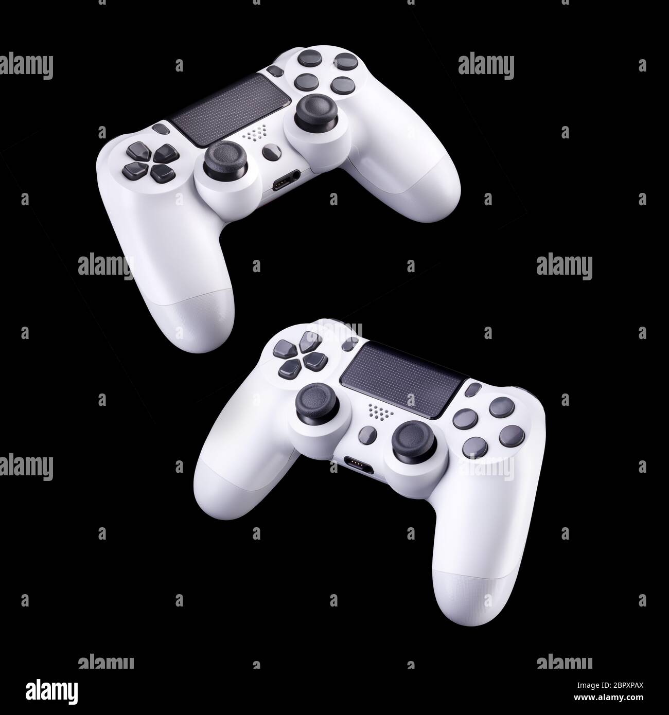 Set of white video game joysticks gamepad isolated on a black ...
