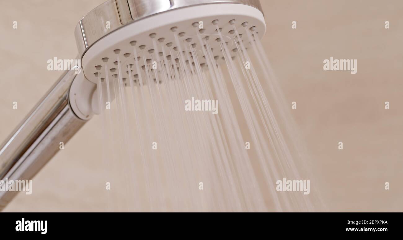Turning on the shower Stock Photo Alamy