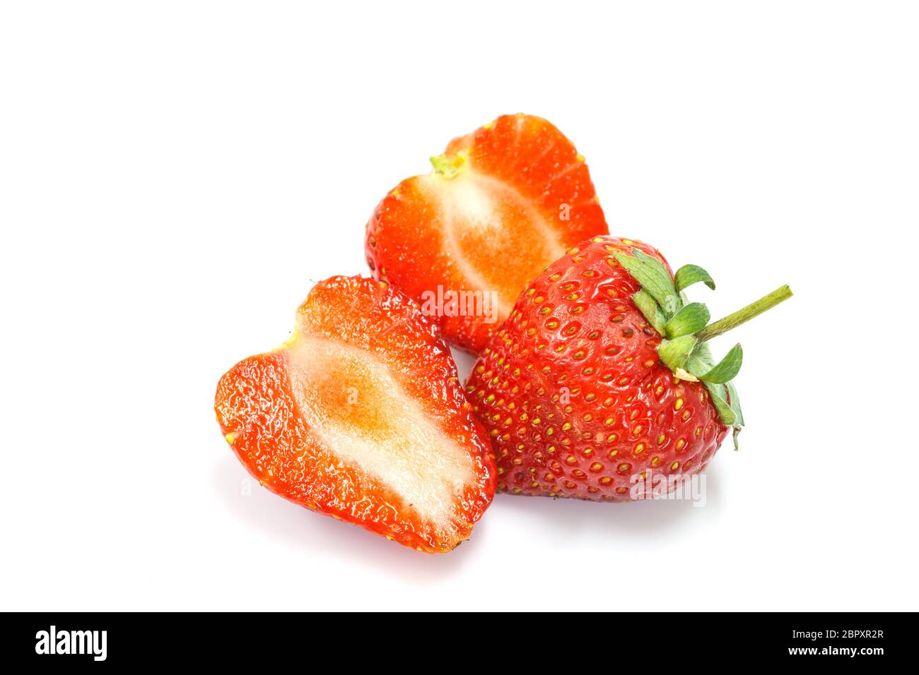 Ripe red strawberries on white background isolated Stock Photo - Alamy