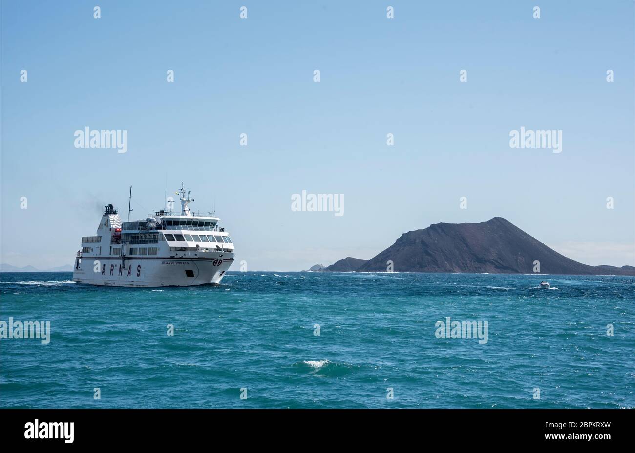 Ferry boat passing Lobos Island off Corralejo, Canary Islands, Spaion, Stock Photo