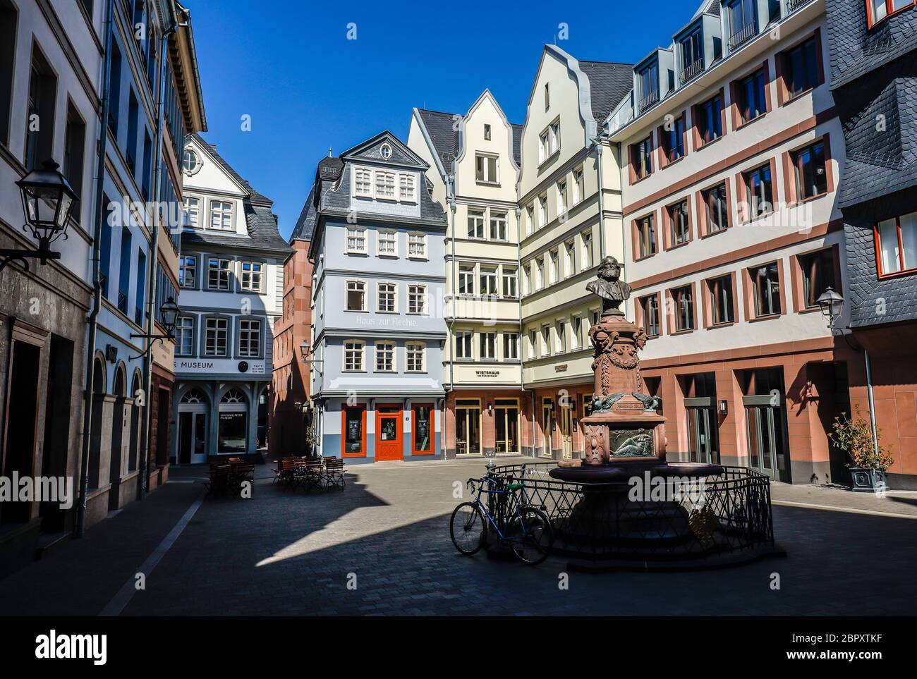 Frankfurt am Main, Hesse, Germany, New Old Town, chicken market with Friedrich-Stoltze fountain, deserted city centre at the time of the corona crisis Stock Photo
