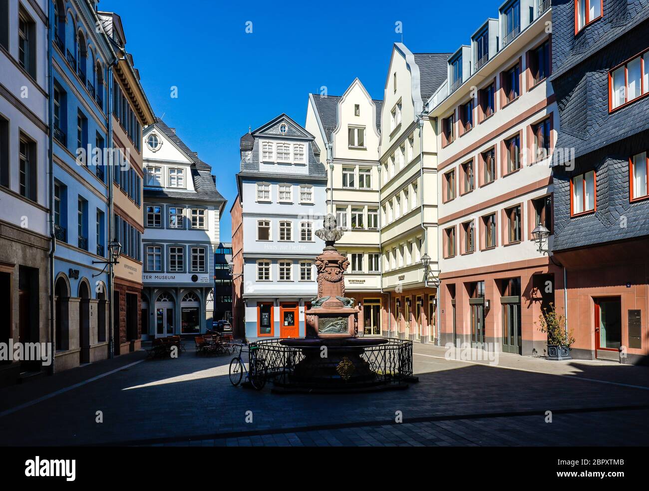 Frankfurt am Main, Hesse, Germany, New Old Town, chicken market with Friedrich-Stoltze fountain, deserted city centre at the time of the corona crisis Stock Photo