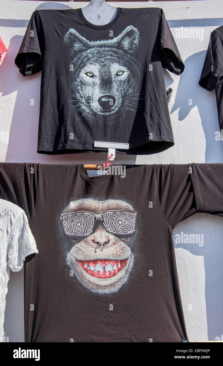 Animal print T shirts displayed at Teguise Market in Lanzarote, Canary Islands. Stock Photo