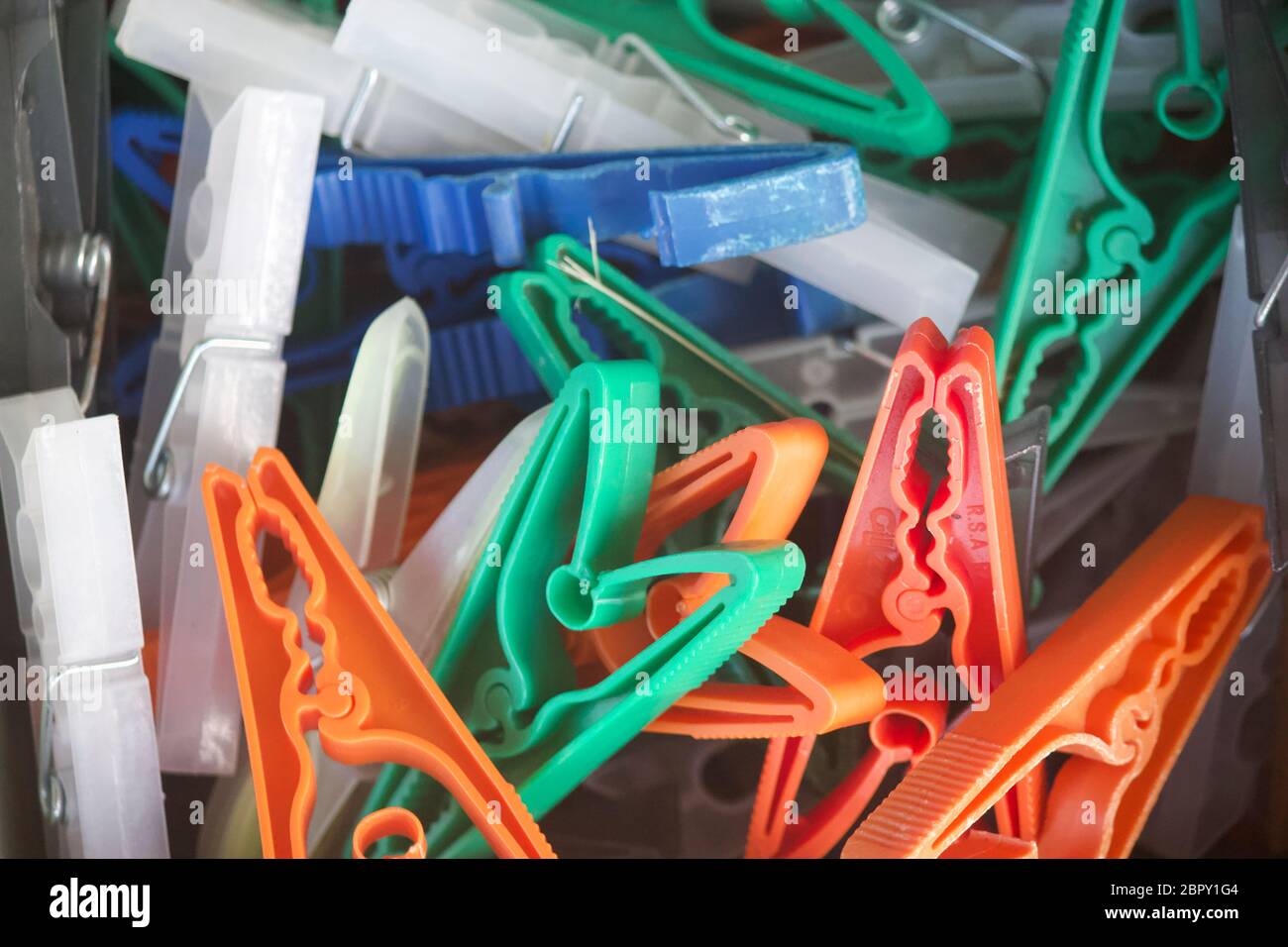 Closeup of a box of pegs used for hanging washing on the washing line