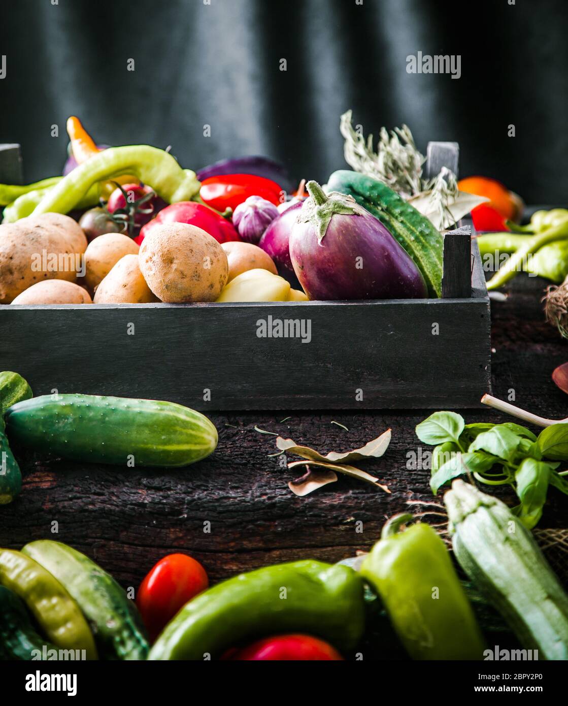 Vegetables on wood. Organic vegetables in rustic setting. Fresh food ...