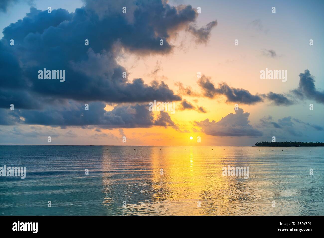Sunrise over ocean in hi-res stock photography and images - Alamy