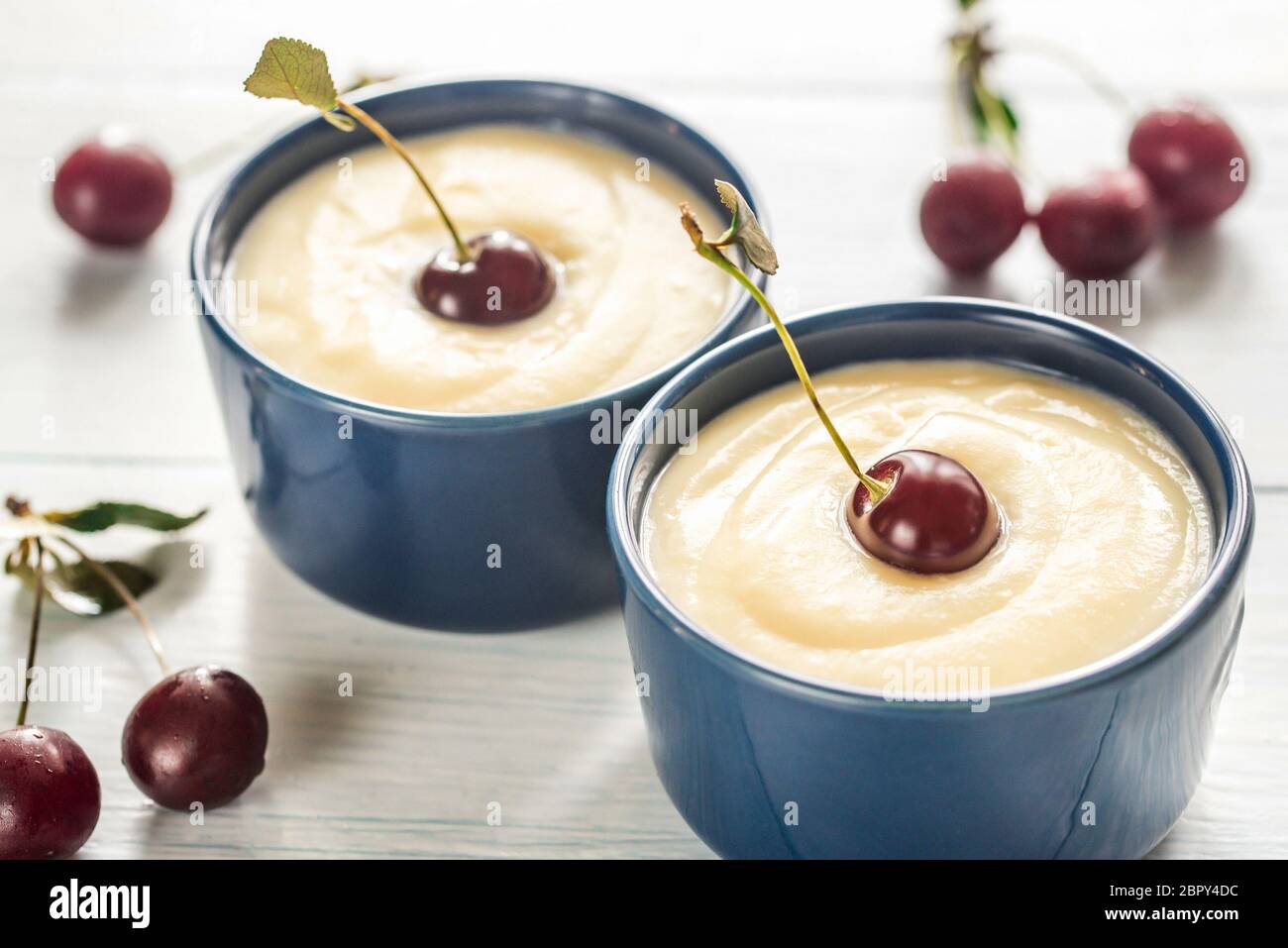 Custard with cherries Stock Photo