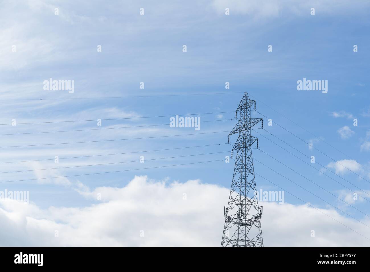 Power tower with blue sky Stock Photo - Alamy