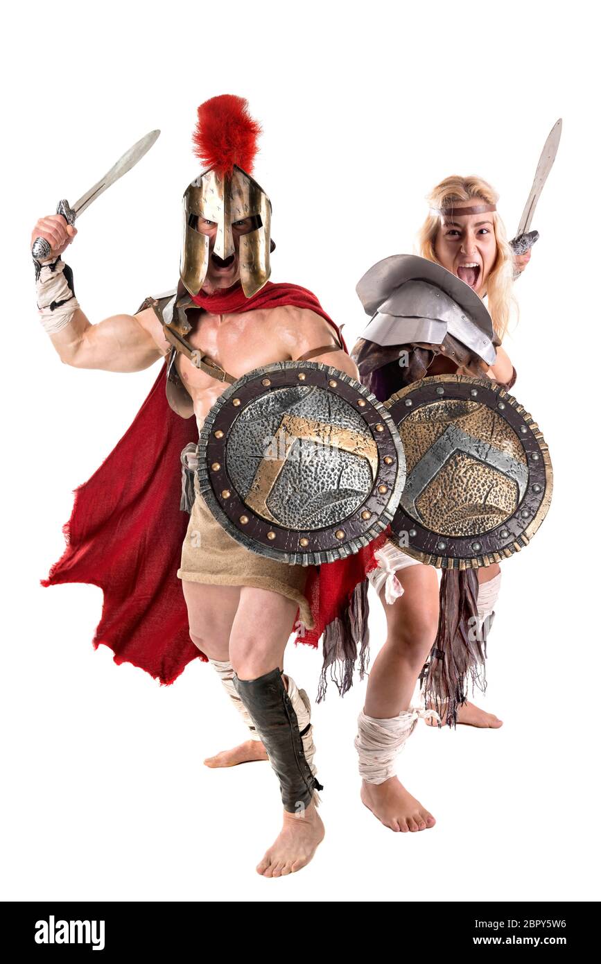 Ancient warrior or Gladiator couple posing in a white background Stock Photo