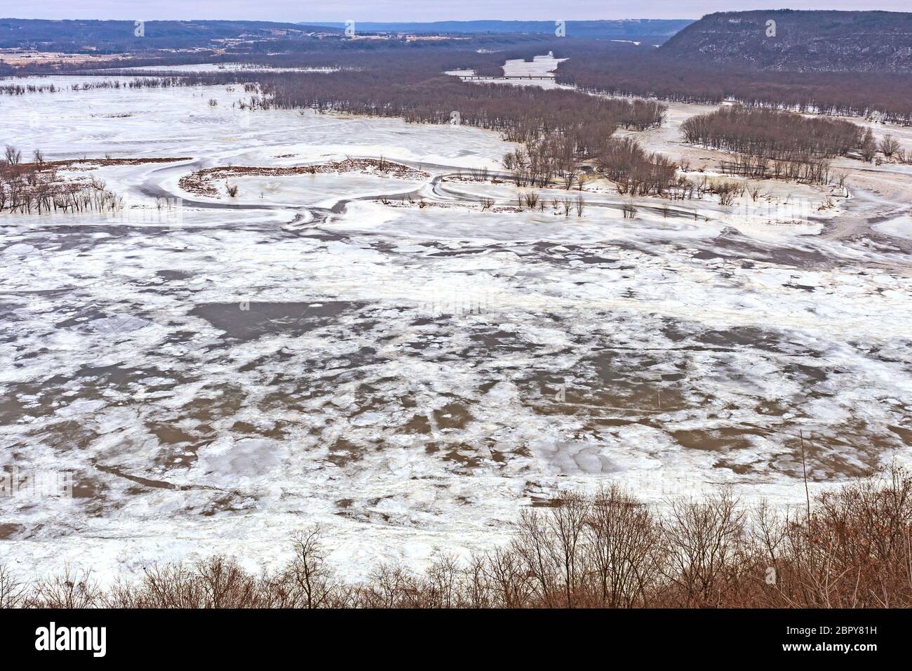 Frozen Confluence of the Wisconsin and Mississippi Rivers in Winter at Pikes Peak State Park in Iowa Stock Photo