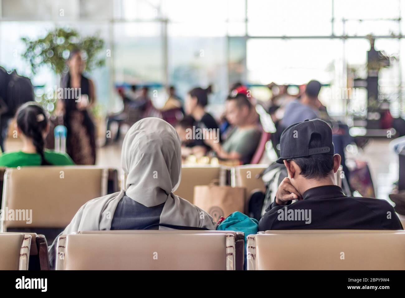 Muslim woman waiting bus bus hi-res stock photography and images - Alamy