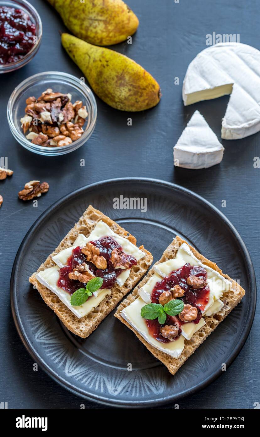 Bread with brie and jam Stock Photo