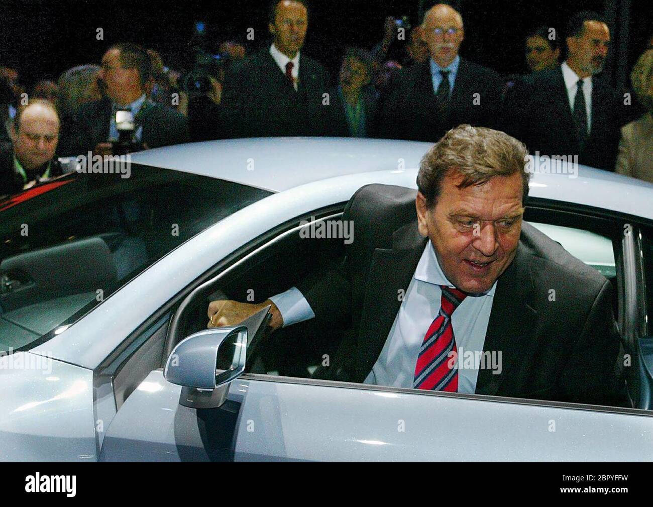 dpa) - Groups of visitors look at the Skoda Roomster at the stand of Skoda  during the IAA international car show in Frankfurt Main, Germany, 9  September 2003. This prototype of a