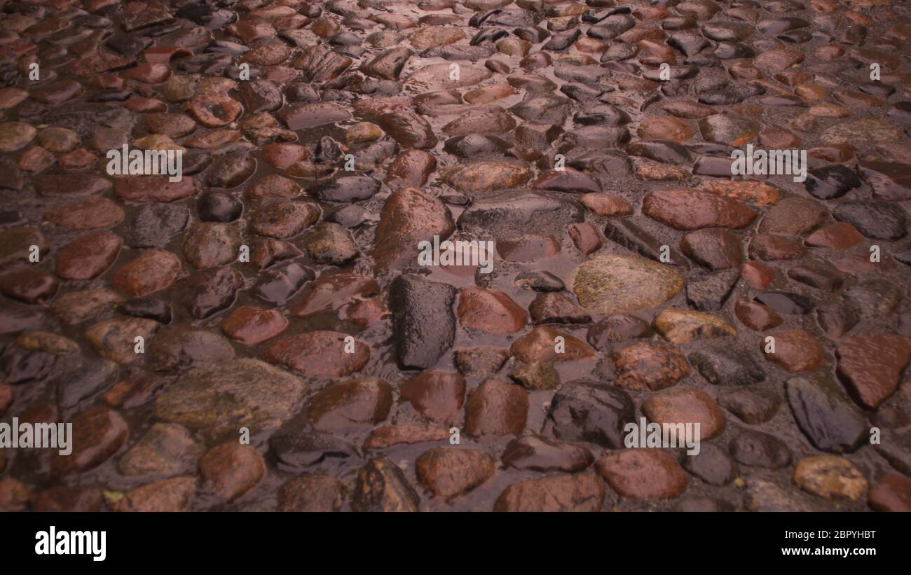 Stone road cobble texture background Stock Photo - Alamy