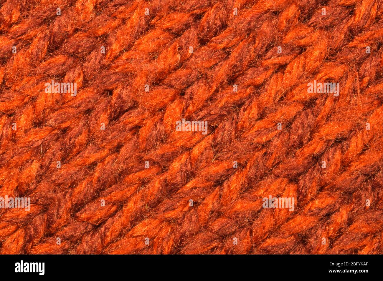 Merino wool colorful dyed textile long hanging strands Stock Photo