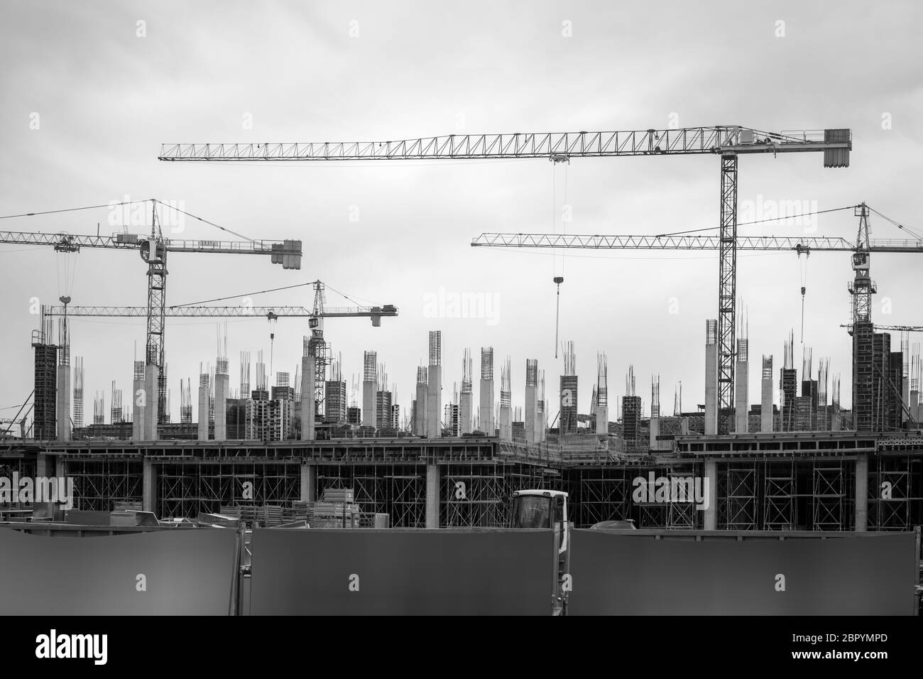 Black and white photo of crane machinery in construction industry Stock ...