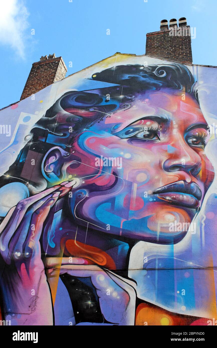 Street Art Psychedelic Strong woman by Mr Cenz Stock Photo